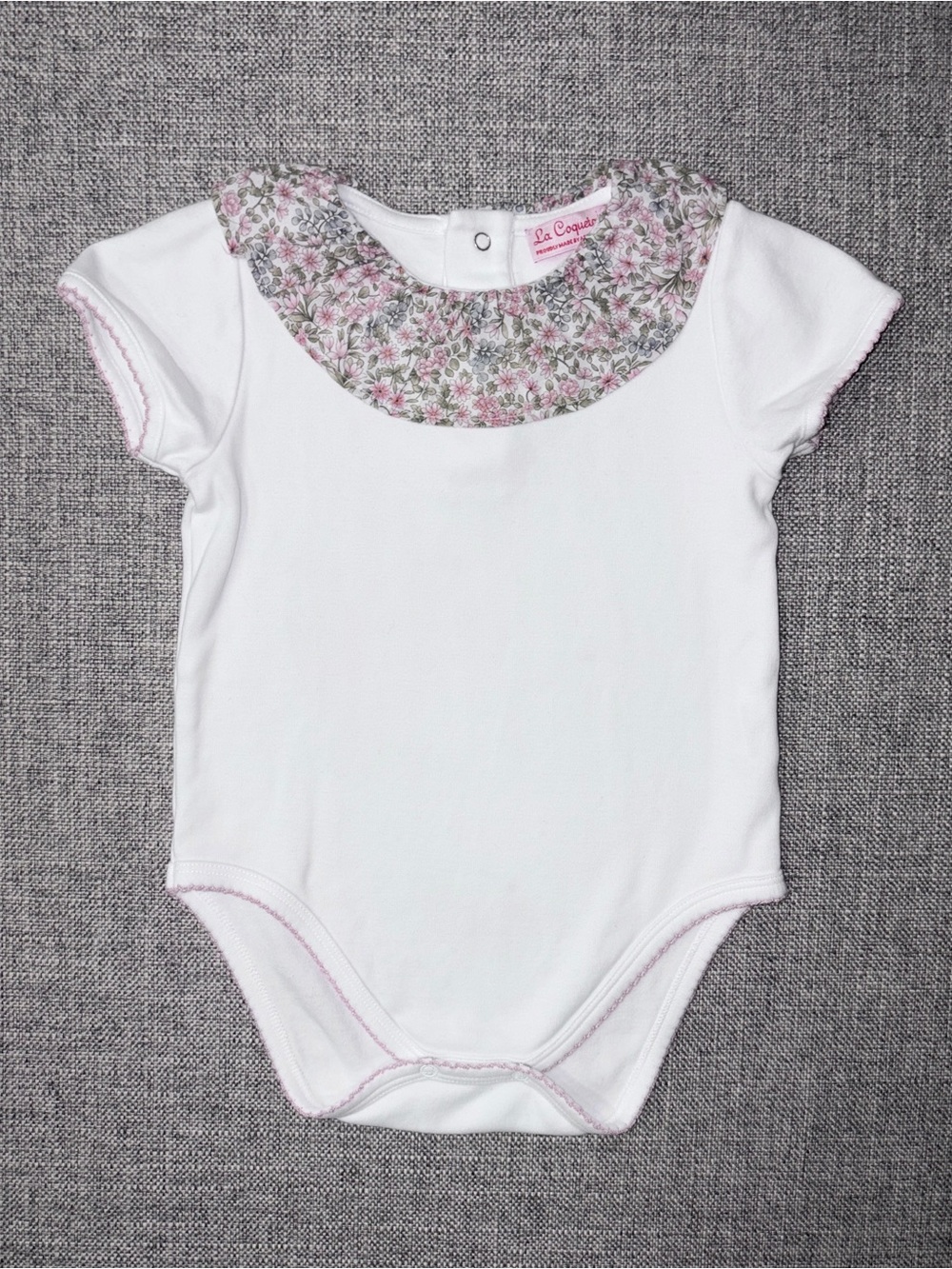 La Coqueta White Baby Bodysuit with Pink Floral Collar VGUC